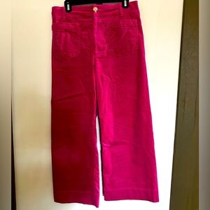 Hot pink corduroy cropped, bell bottom Maeve pants from Anthropology, size 30.